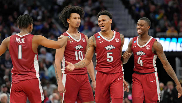Mar 24, 2022; San Francisco, CA, USA; Arkansas Razorbacks guard JD Notae (1) and forward Jaylin Williams (10) and guard Au’Diese Toney (5) and guard Davonte Davis (4) react after a play against the Gonzaga Bulldogs during the second half in the semifinals of the West regional of the men’s college basketball NCAA Tournament at Chase Center. The Arkansas Razorbacks won 74-68.